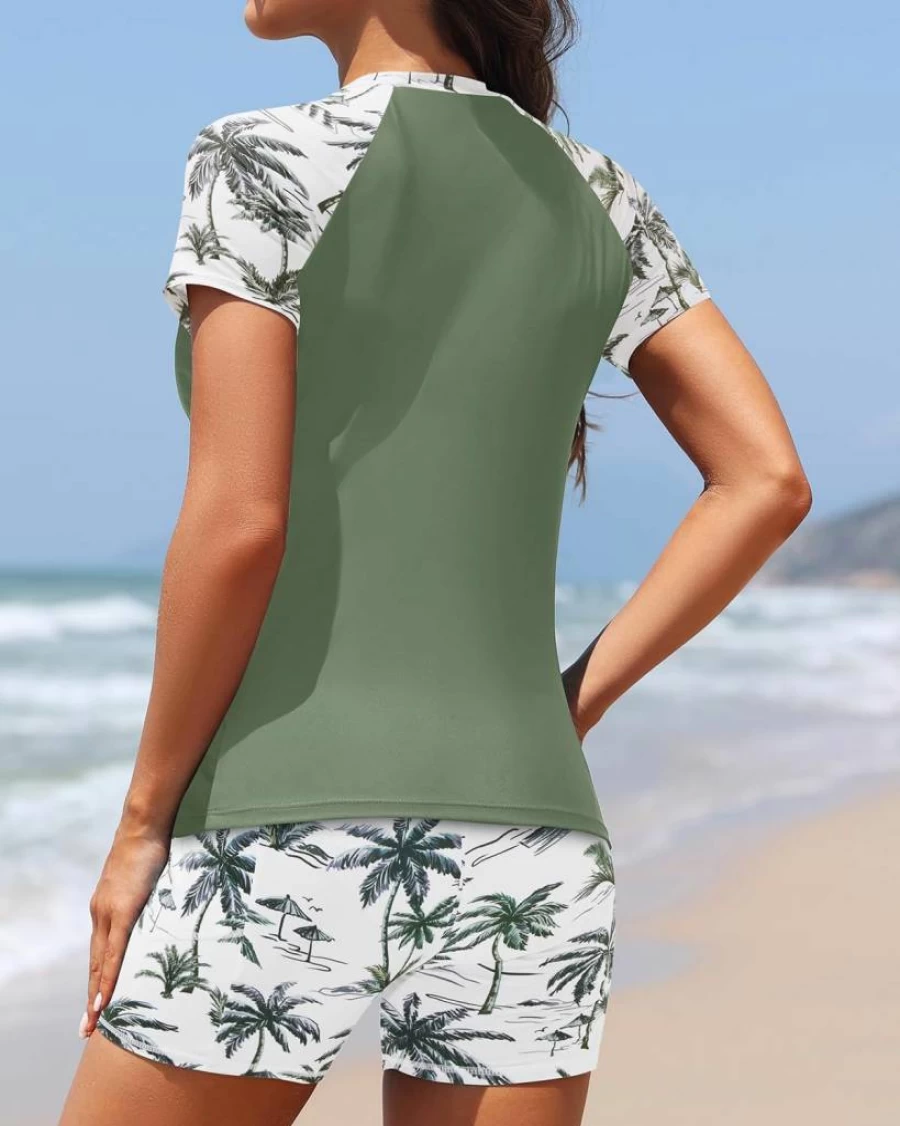Daci Women's 2-Piece Rash Guard Swimsuit - UPF 50+ Short Sleeve Swim Top with Built-In Bra & Pocketed Swim Shorts